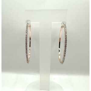 Medium sized rose gold-toned circular hoops lined with rhinestones